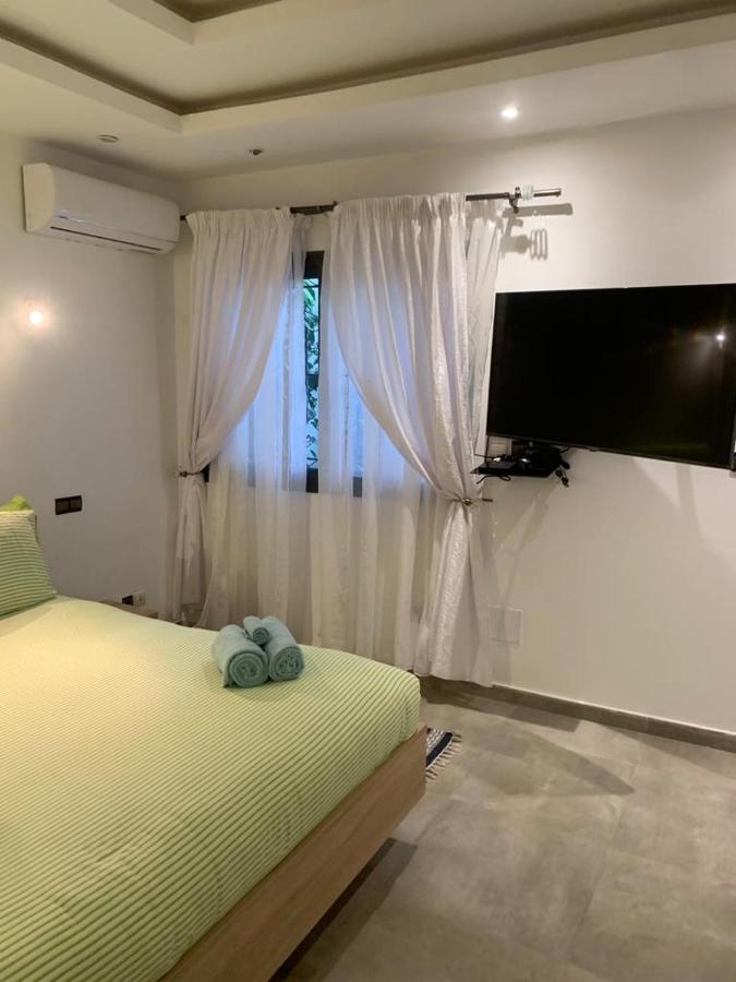 Luxury Suites Chester One Dakar Esterno foto